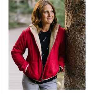 Reversible red jacket.